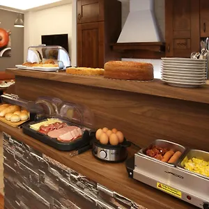 ** Couette-café J24 Italie